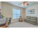 Versatile bedroom featuring a ceiling fan, window with blinds, and a small loveseat at 405 Decatur Dr, Summerville, SC 29486