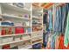 Organized walk-in closet with shelving, drawers, and hanging rods at 405 Decatur Dr, Summerville, SC 29486