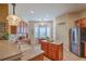 Well-equipped kitchen featuring wooden cabinets, granite countertops, and modern stainless steel appliances at 405 Decatur Dr, Summerville, SC 29486