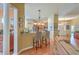 Open-concept kitchen with bar seating seamlessly connected to the living area at 405 Decatur Dr, Summerville, SC 29486