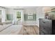 Bright bedroom featuring a desk, golf art, and abundant natural light at 406 Cadbury Loop, Summerville, SC 29486