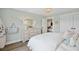 Bright bedroom with a dresser, mirror, and comfortable bed, creating a serene and inviting atmosphere at 406 Cadbury Loop, Summerville, SC 29486