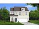 Charming two-story home featuring classic design elements and a well-manicured lawn at 406 Cadbury Loop, Summerville, SC 29486