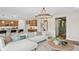 Bright living space with open floor plan, kitchen view, and modern décor at 406 Cadbury Loop, Summerville, SC 29486