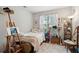 Inviting bedroom with natural light, unique decorations, and an open space for a creative studio at 45 Sycamore Ave # 811, Charleston, SC 29407
