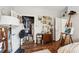 Cozy bedroom boasts wood floors, closet, and an art display area with easel at 45 Sycamore Ave # 811, Charleston, SC 29407