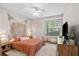 Inviting bedroom with a ceiling fan, large window, and warm, neutral tones at 45 Sycamore Ave # 811, Charleston, SC 29407