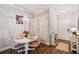 Charming dining area with elegant chandelier and hardwood floors at 45 Sycamore Ave # 811, Charleston, SC 29407