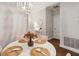 Cozy dining room featuring stylish lighting and neutral color palette at 45 Sycamore Ave # 811, Charleston, SC 29407