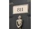 Close-up of a door knocker on front door of unit at 45 Sycamore Ave # 811, Charleston, SC 29407