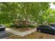 Charming home with a brick facade and inviting curb appeal, shaded by mature trees at 45 Sycamore Ave # 811, Charleston, SC 29407