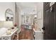 Warm and inviting entryway with hardwood floors leading into the open-concept kitchen at 45 Sycamore Ave # 811, Charleston, SC 29407