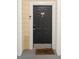 Close-up of a unit's front door with a 'Home Sweet Home' welcome mat at 45 Sycamore Ave # 811, Charleston, SC 29407