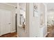 Bright kitchen featuring stainless steel appliances, marble countertops and a breakfast bar through an open doorway at 45 Sycamore Ave # 811, Charleston, SC 29407