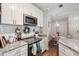 Modern kitchen with stainless steel appliances and access to dining area at 45 Sycamore Ave # 811, Charleston, SC 29407