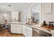 Open kitchen with marble countertops and elegant details at 45 Sycamore Ave # 811, Charleston, SC 29407