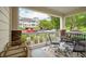 Relaxing covered porch with comfortable seating and views of the surrounding community at 45 Sycamore Ave # 811, Charleston, SC 29407
