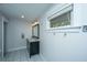 Bright bathroom featuring a double sink vanity and decorative hooks at 4515 Holmes Ave, North Charleston, SC 29405