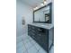 Modern bathroom vanity with double sinks and a large mirror at 4515 Holmes Ave, North Charleston, SC 29405