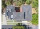 Aerial view of a modern home with a rooftop deck and sleek design at 4637 Bonnie Marie Way, North Charleston, SC 29405