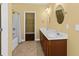 This bathroom has a double sink vanity with a marble countertop and ample storage at 4637 Bonnie Marie Way, North Charleston, SC 29405