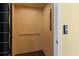 Spacious home elevator with wood paneled walls, showcasing accessibility and convenience at 4637 Bonnie Marie Way, North Charleston, SC 29405