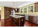 Well-equipped kitchen with granite countertops, stainless steel appliances, a large island, and lots of cabinets at 4637 Bonnie Marie Way, North Charleston, SC 29405