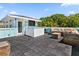 A spacious roof top deck with a built-in kitchen area, grill and an outdoor sectional sofa with pillows at 4637 Bonnie Marie Way, North Charleston, SC 29405
