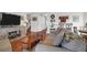 Inviting living area with hardwood floors, cozy seating, and modern decor at 4856 Carnoustie Ct, Summerville, SC 29485