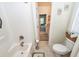 Bathroom and shower with a toilet and a view of the bedroom at 4991 Sound View Dr, Mount Pleasant, SC 29466