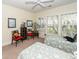 Nicely decorated bedroom with two beds and a view of the trees at 4991 Sound View Dr, Mount Pleasant, SC 29466