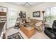 Cozy bedroom with a ceiling fan, natural light, and a door leading to a balcony at 4991 Sound View Dr, Mount Pleasant, SC 29466