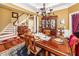 Formal dining room with hardwood floors, statement chandelier, and seating for eight at 4991 Sound View Dr, Mount Pleasant, SC 29466