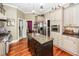 Elegant kitchen features an island with granite countertops and stainless steel appliances at 4991 Sound View Dr, Mount Pleasant, SC 29466