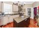 Spacious kitchen with granite counters, stainless appliances, and hardwood flooring at 4991 Sound View Dr, Mount Pleasant, SC 29466