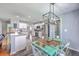 Open concept dining area and kitchen featuring stainless appliances and modern lighting at 5032 Ballantine Dr, Summerville, SC 29485