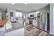 Modern kitchen features granite countertops, stainless appliances, and ample cabinet space at 5032 Ballantine Dr, Summerville, SC 29485