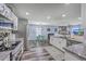 Open-concept kitchen, living and dining area with stainless appliances and eat in kitchen at 5032 Ballantine Dr, Summerville, SC 29485