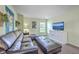 Bonus room featuring a leather couch, carpet flooring, neutral colors, natural light, and a TV at 5032 Ballantine Dr, Summerville, SC 29485