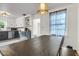 Eat-in kitchen area with a large dark wood dining table with room to gather at 5075 Walker St, North Charleston, SC 29405