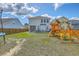 Expansive backyard featuring playset, trampoline, and privacy fence at 508 Alderly Dr, Moncks Corner, SC 29461