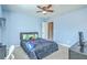 Blue bedroom with ceiling fan, bed with game themed bedding, and a window for natural light at 508 Alderly Dr, Moncks Corner, SC 29461