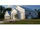 Community garage featuring modern architecture, spacious roll-up doors, and well-kept landscaping at 508 Alderly Dr, Moncks Corner, SC 29461