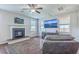 Cozy living room featuring a fireplace and large-screen television for entertainment at 508 Alderly Dr, Moncks Corner, SC 29461
