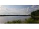 Picturesque view of a serene community pond with lush greenery and a tranquil atmosphere at 508 Alderly Dr, Moncks Corner, SC 29461