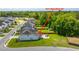 An aerial view of the home with a well-manicured lawn and a patio area with a pergola at 511 Nandina Dr, Goose Creek, SC 29445