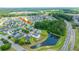 Wide aerial view showing the home within a community, highlighting its proximity to green spaces and other homes at 511 Nandina Dr, Goose Creek, SC 29445