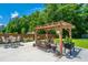 Backyard with outdoor dining and seating, featuring a pergola for shading you from the sun at 511 Nandina Dr, Goose Creek, SC 29445