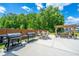 Backyard with outdoor dining and seating, featuring a grill and smoker for hosting barbeques at 511 Nandina Dr, Goose Creek, SC 29445