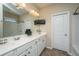 Bathroom with double sinks, TV and lots of storage space in vanity at 511 Nandina Dr, Goose Creek, SC 29445